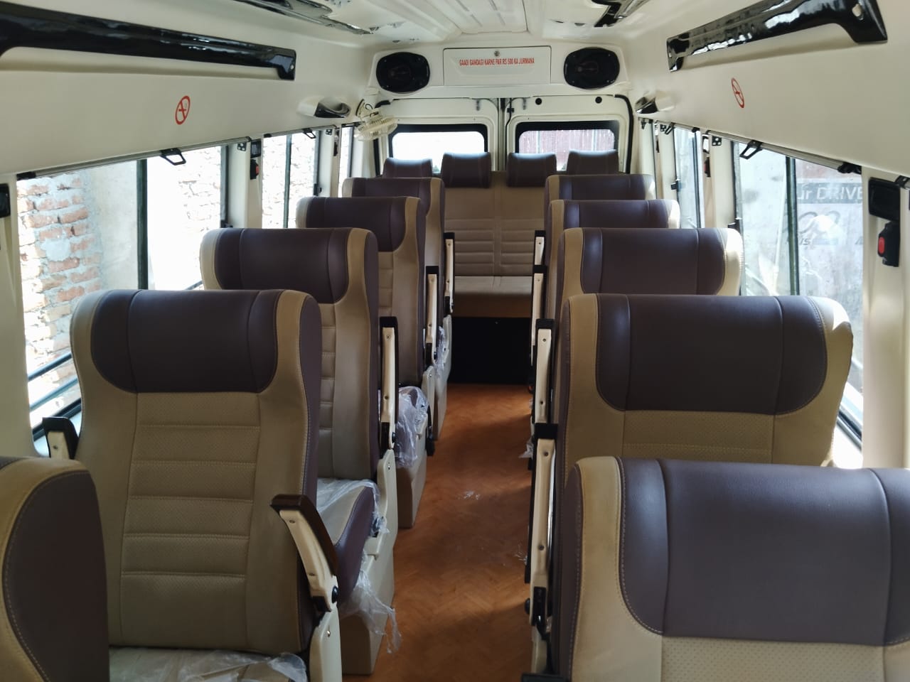 12 seater tempo traveller photo